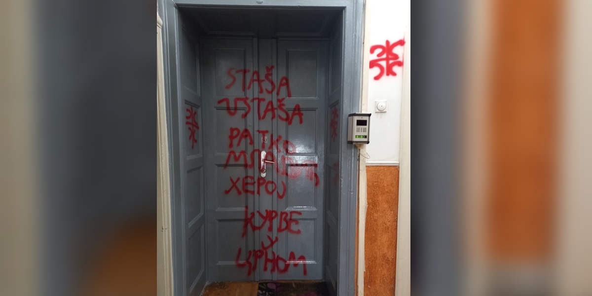 žena