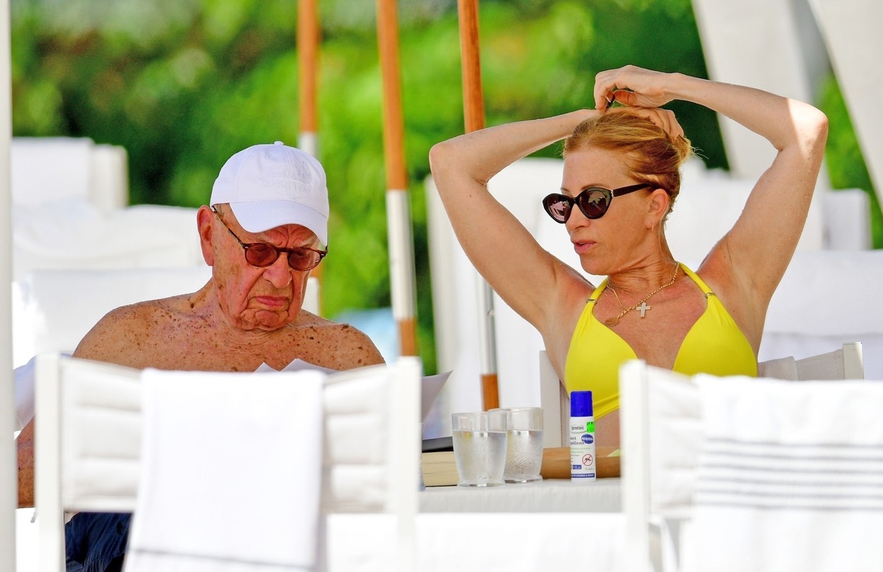 *PREMIUM-EXCLUSIVE* BRIDGETOWN, BARBADOS - *MUST CALL FOR PRICING* The Australian-American business magnate Rupert Murdoch laps up the hot Caribbean sunshine as he chills out on the beaches of Barbados. Cooling off from the blazing heat, 91-year-old Rupert made his way for a dip in the warm blue sea, making a splash with his scantily-clad mystery woman dressed in a striking yellow bikini. It would seem the billionaires are out in force as the British billionaire, the chairman of JCB, Anthony Bamford was also spotted as he went shirtless out on the golden sandy beach as the gang thoroughly enjoyed their West Indian getaway. PICS TAKEN: 12/01/2023 BACKGRID UK 14 JANUARY 2023,Image: 749639883, License: Rights-managed, Restrictions: , Model Release: no, Pictured: Rupert Murdoch